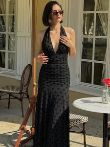 Chic black polka dot halter maxi dress with deep V-neck and backless retro French style