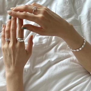 Minimalist 925 sterling silver beaded and smooth wide band rings styled on model hand