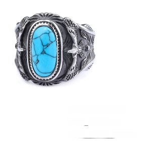 Detail view of vintage eagle turquoise ring with intricate feather carving and sizing info