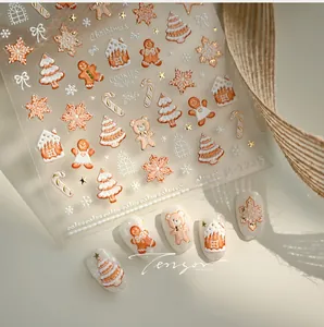 5D geprägte Weihnachts-Nagelaufkleber mit Lebkuchenmann- und Schneeflockenmustern