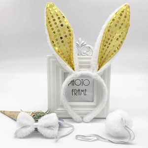 Detailed set of white plush rabbit ears headband with gold sequins, bowtie, and tail