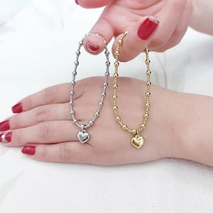 Polished 18K gold and silver stainless steel heart charm bead bracelets for women