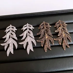 Vintage leaf tassel drop earrings with sparkling rhinestones in silver and bronze finish