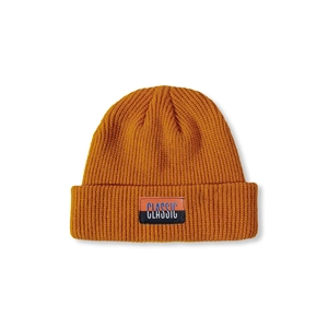 Detailed close-up of mustard yellow knit beanie featuring a double Classic label design