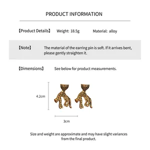 Detail showing vintage gold leopard earrings dimensions of 4.2cm by 3cm on white background