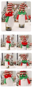 Detail of Christmas gnome wine bottle covers with red and green knit collars for decor