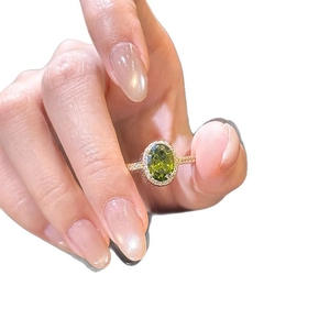 Elegant 18k gold plated open ring with oval green gemstone and halo diamonds