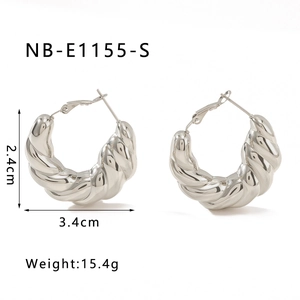 Polished silver twisted hoop earrings with chunky croissant texture measuring 2.4cm by 3.4cm