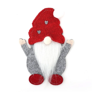 Christmas gnome cutlery holder with red knit hat and heart pattern for table decor
