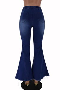 Close-up of high-waist flared jeans featuring back pockets and distressed fringe hem