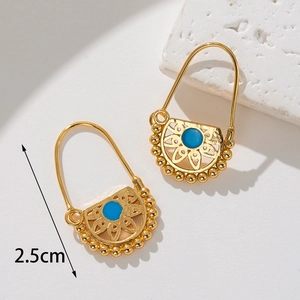 Macro detail of 18K gold-plated bohemian earrings with blue stone inlay and 2.5cm size mark