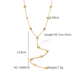 Detail of 18K gold plated Y-necklace with crystal pendants and size measurements
