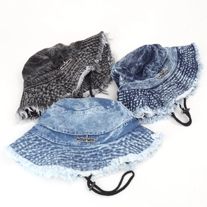 Three-color set of washed denim bucket hats with frayed edges and metal pins