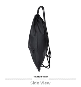 Detail view of the black drawstring backpack featuring a side zipper pocket and water-resistant fabric