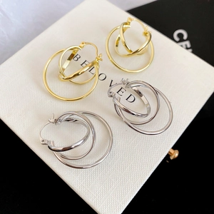Minimalist double layered hollow round hoop earrings in gold and silver finishes