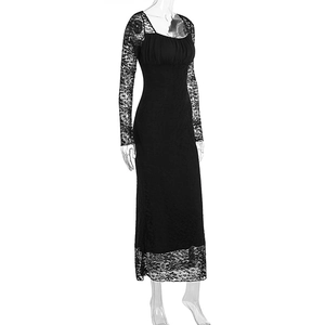 Detail of square neck black dress with lace sleeves and ruched bodice craftsmanship