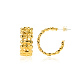 Detail of golden C-shaped hoop earrings featuring woven rope texture and polished finish