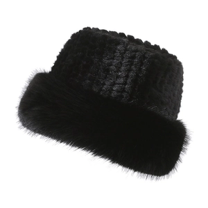 Close-up of premium black faux fur bucket hat showing soft plush texture and detail