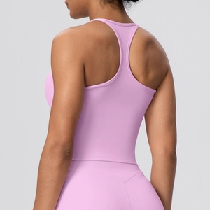 Detail of racerback yoga tank top in light purple featuring flat-seam stitch and dry-fit fabric