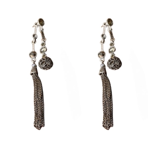 Vintage silver long tassel earrings with metallic balls and inlaid gems on white background