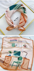 Detail of square silk scarf with modern office illustration in pink and green