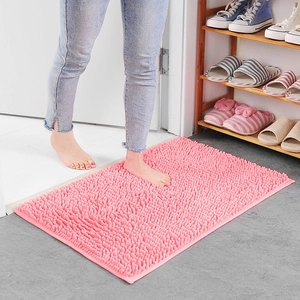 Zachte roze chenille absorberende antislip badmat voor badkamer en entree van woning