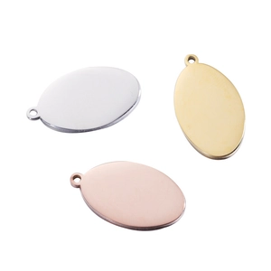 Three oval stainless steel jewelry tags in silver, gold and rose gold finishes