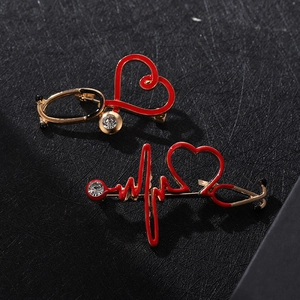 Creative heartbeat stethoscope enamel brooches with gold plating and white zircon