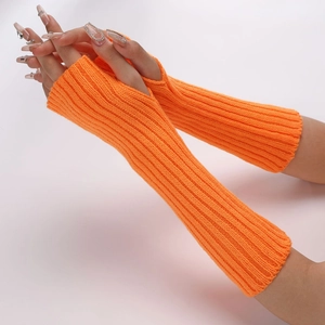 Detail of neon orange knitted fingerless sleeves with thumb hole and vertical ribbed texture