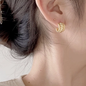Chic gold twisted rope hoop earrings for women with minimalist woven texture design