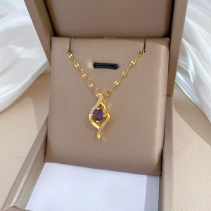 Elegant gold necklace with purple amethyst and zircon pendant in a premium gift box