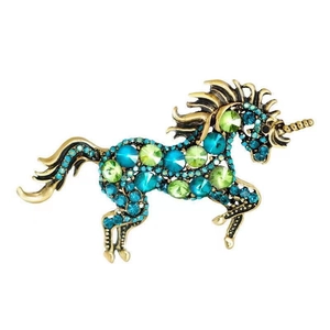 Vintage unicorn horse brooch in antique gold finish with green and blue crystals