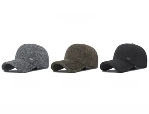 Detailed view of winter baseball caps with metal China tag and tweed texture in 3 colors