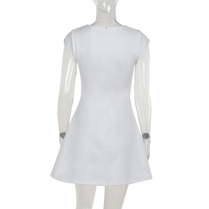 Detailed back view of a white A-line mini dress with a centered invisible zipper closure