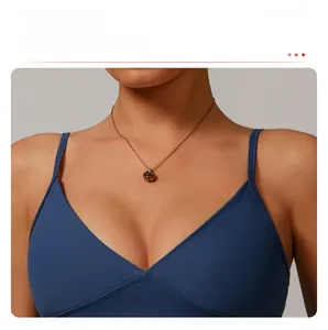 Macro detail of navy blue V-neck sports bra with high-quality seamless elastic fabric