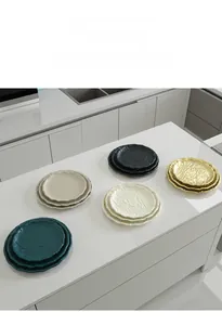 Close-up of stacked corrugated iron trays in multiple colors for home decor