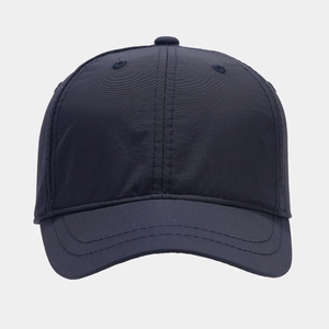 Detailed macro view of dark blue baseball cap showing breathable quick-dry fabric texture