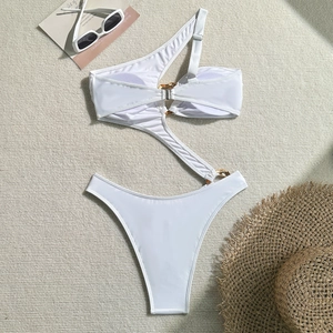 Detail of white cutout one-piece swimsuit with single shoulder and gold ring accents