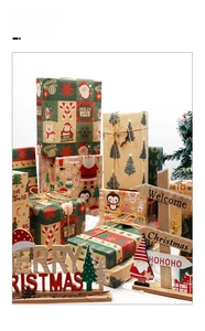 Detail showing stacked Christmas gift boxes wrapped in assorted festive kraft paper patterns