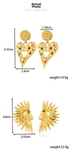 Detailed view of bohemian gold heart and sun goddess earrings with size and weight specs