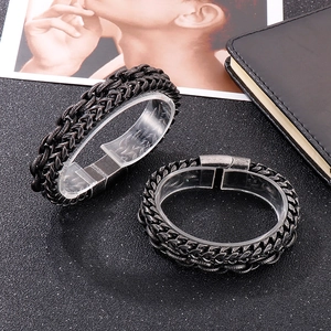 Detail of vintage punk rock braided stainless steel bracelets for men with magnetic clasp