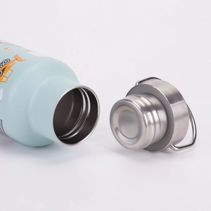 Detail of blue stainless steel bottle opening with cartoon patterns and handle lid