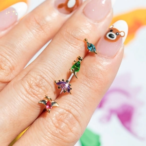 Cute gold plated dinosaur earrings with colorful cubic zirconia and crystal accents