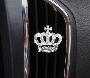 Detail of silver crown car air vent clip with sparkling rhinestones and Juicy text