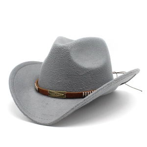 Close-up of brown woven band and vintage bronze buckle on a gray wool felt cowboy hat