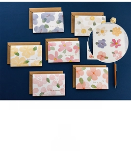 Detailed view of 3D floral greeting cards with kraft envelopes and decorative stickers