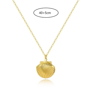 Detail view of gold shell locket pendant with 40+5cm adjustable link chain length