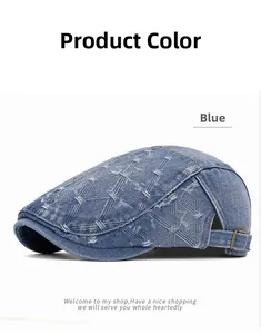 Detail of blue denim ivy cap featuring diamond quilted pattern and metal buckle