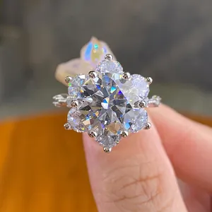 Luxury 5 carat sunflower moissanite ring in 925 sterling silver worn on a finger