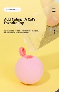 Detail view of filling catnip into the pink interactive smart pet ball toy